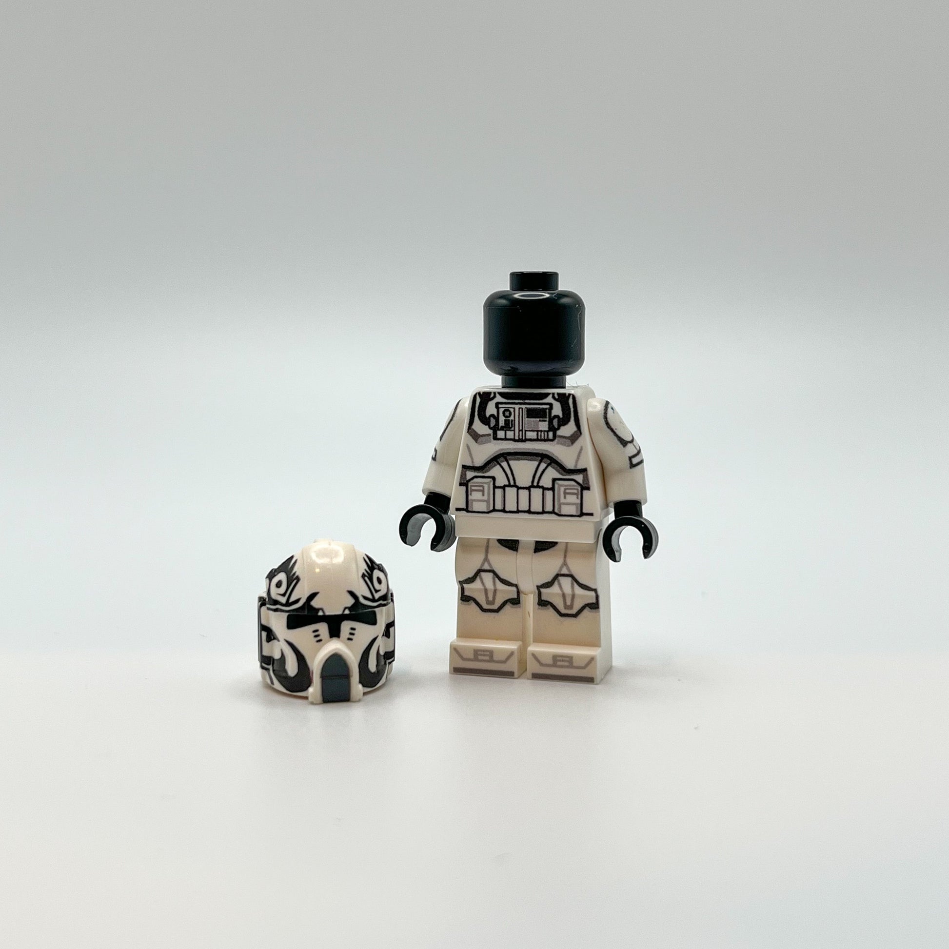 UV Printed LEGO® Clone Wars Pilot with Clone Army Customs helmet on ground next to minifigure