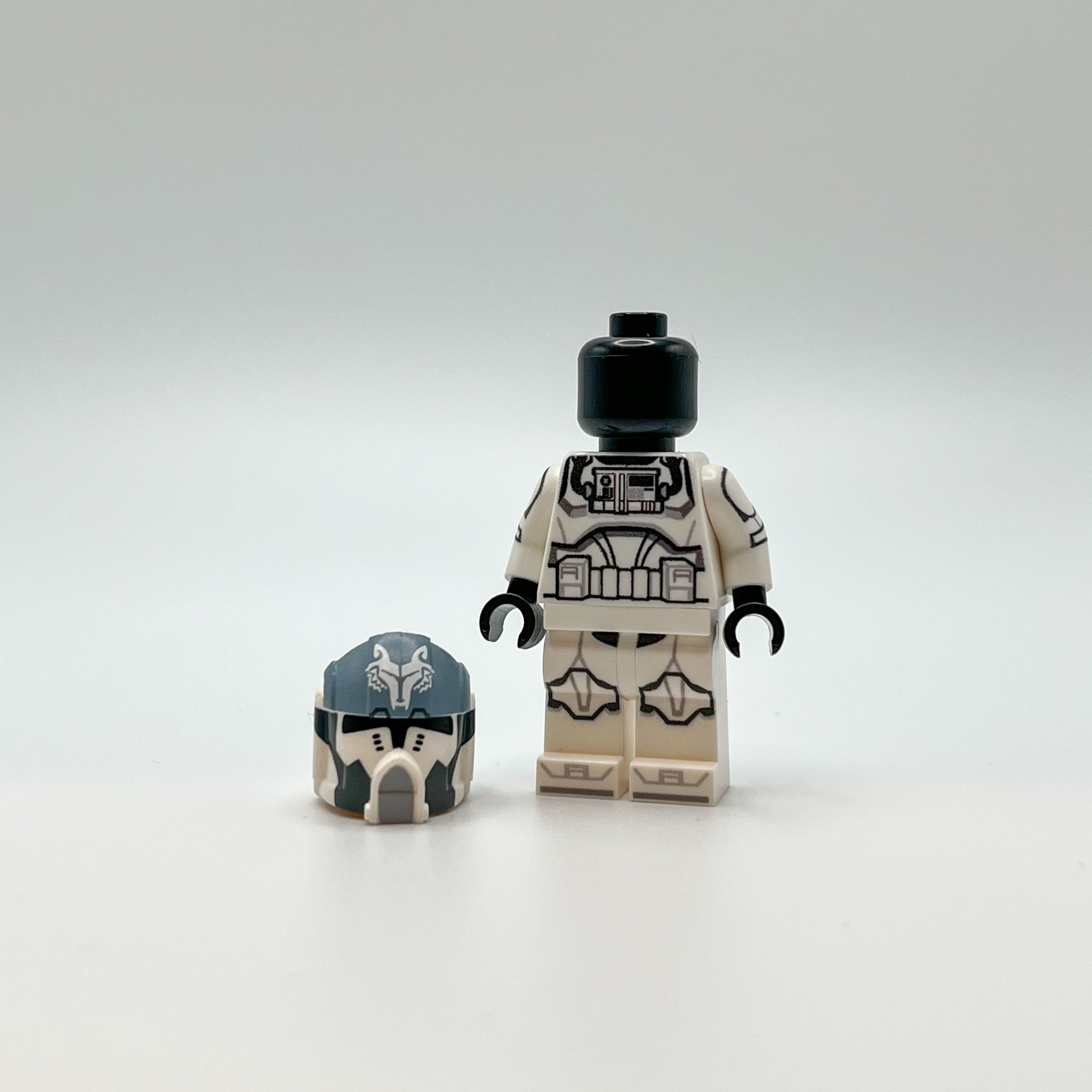 Custom Clone 104th Wolfpack Pilot with helmet on ground next to minifigure with blank black head