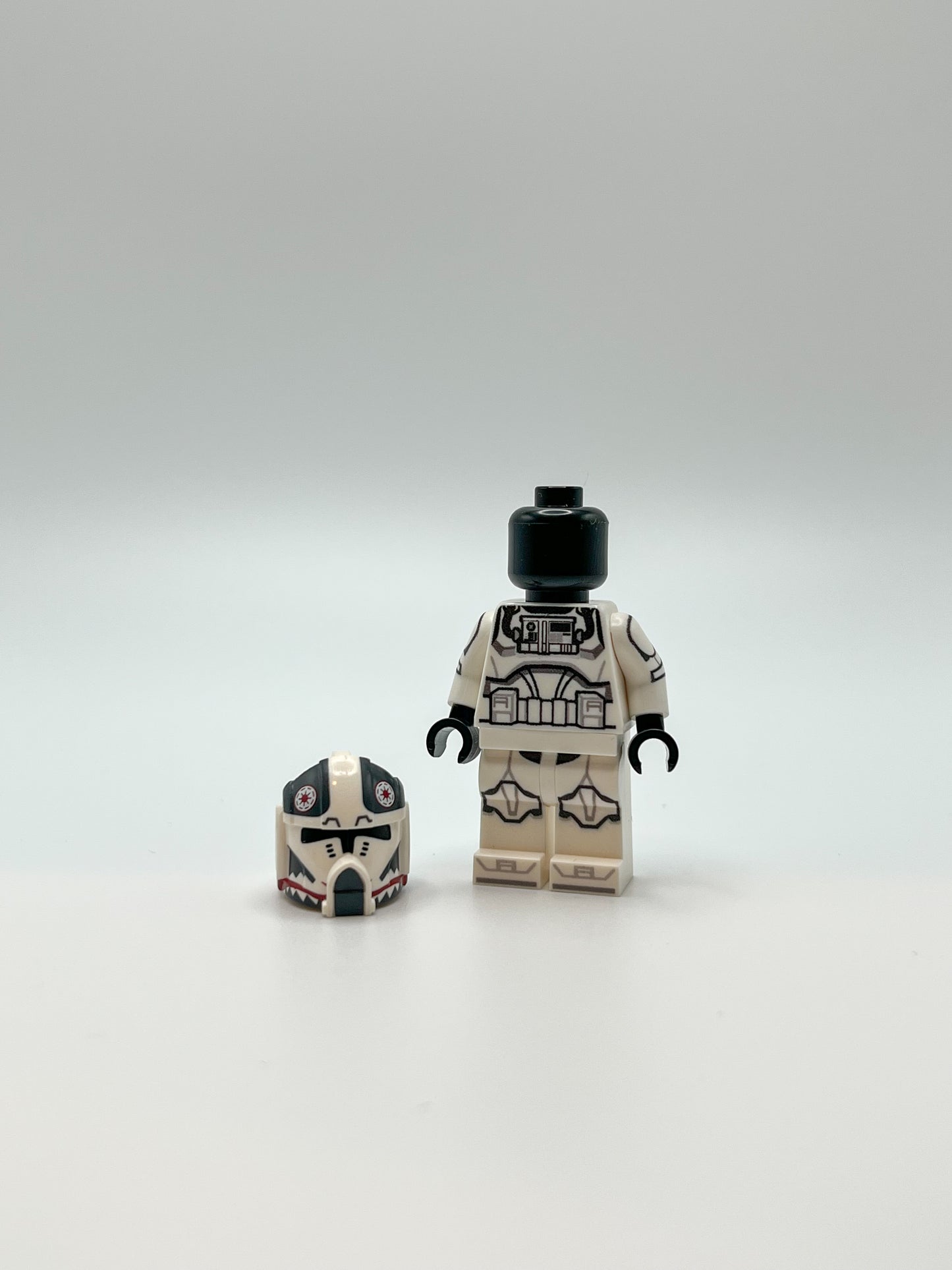 Custom Printed LEGO® Minifig Pilot Matchstick with Clone Army Customs pilot helmet on the ground